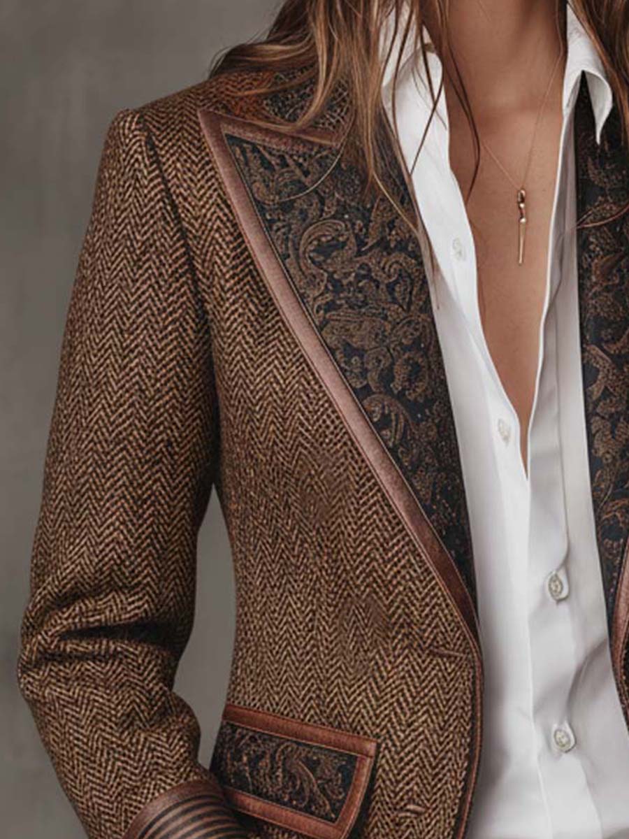 Blazer de mujer de espiga con paneles estampados.