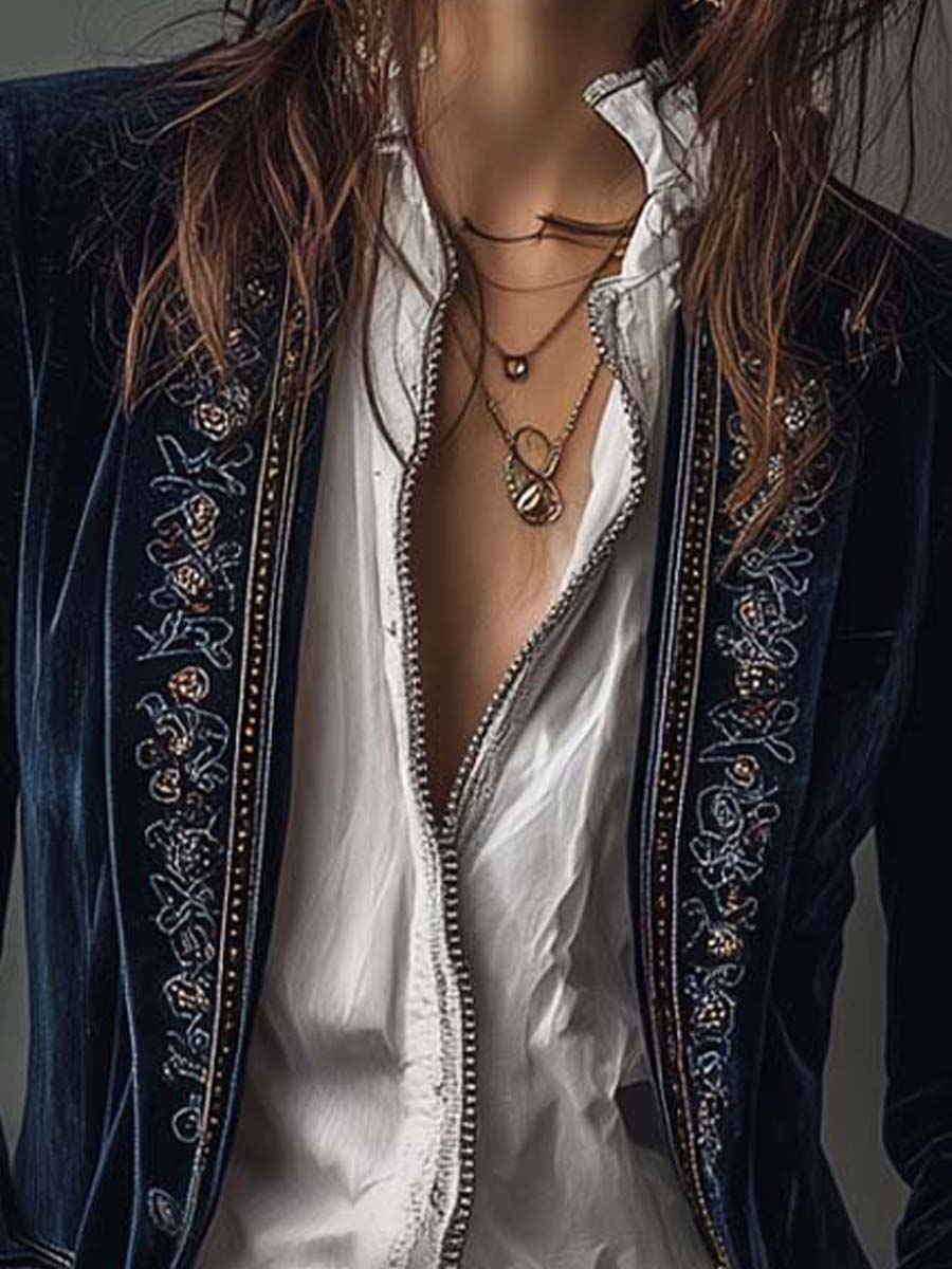 Chaqueta larga vintage de mujer azul marino bordada.