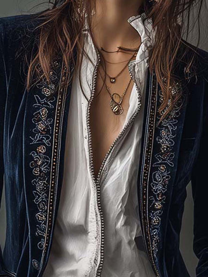 Chaqueta larga vintage de mujer azul marino bordada.