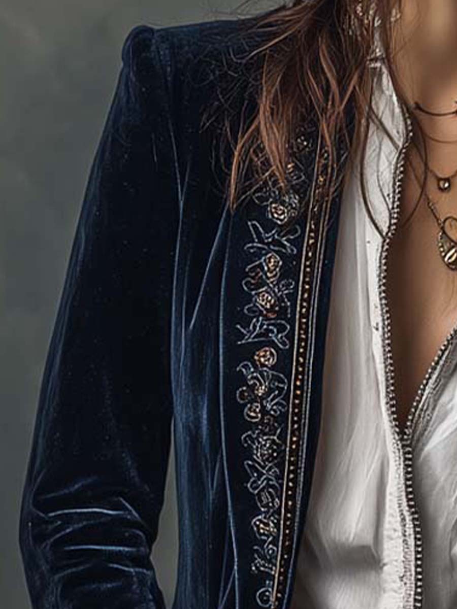 Chaqueta larga vintage de mujer azul marino bordada.